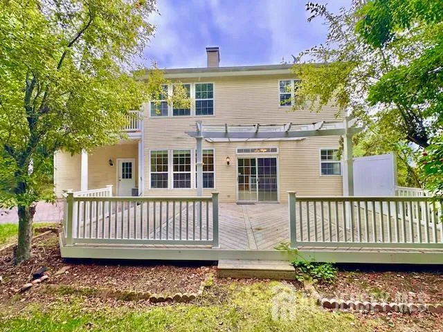 a view of a yard with a tree