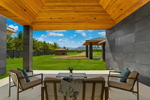 a view of yard with patio