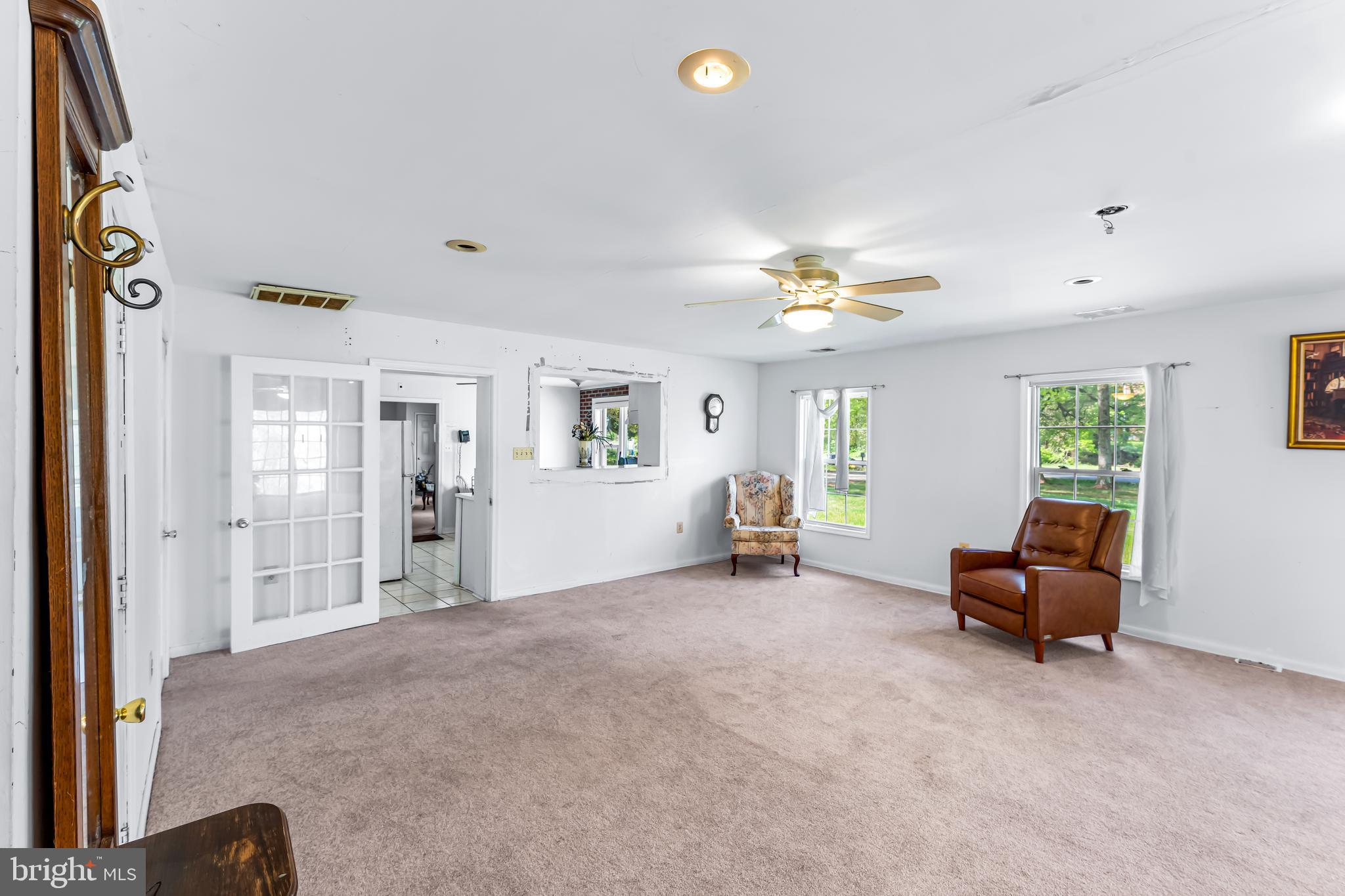 1112 Owens Road Oxon Hill, MD 20745 - Photo 12 of 30 a living room with furniture and a window