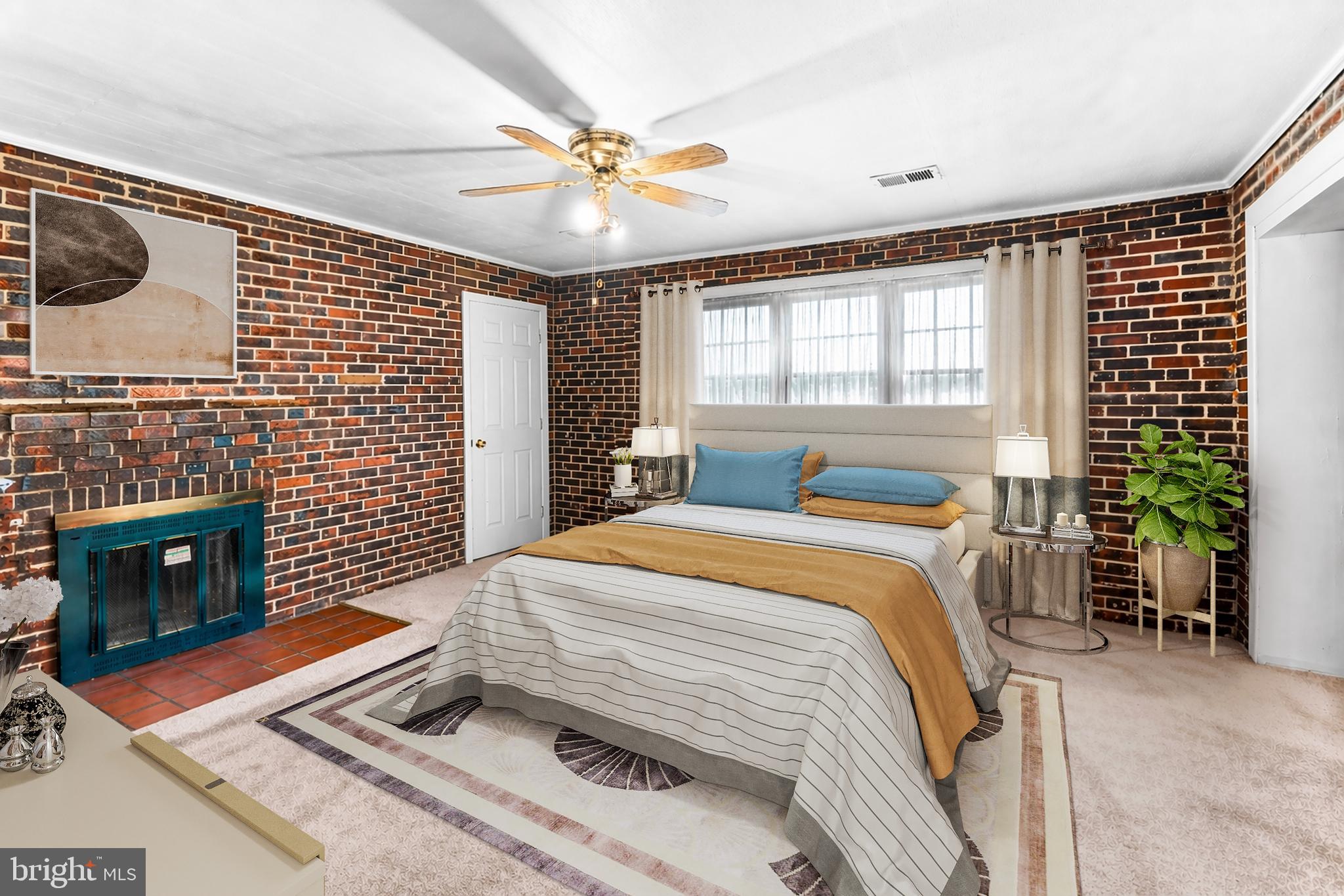 1112 Owens Road Oxon Hill, MD 20745 - Photo 18 of 30 a bedroom with a bed and a fireplace