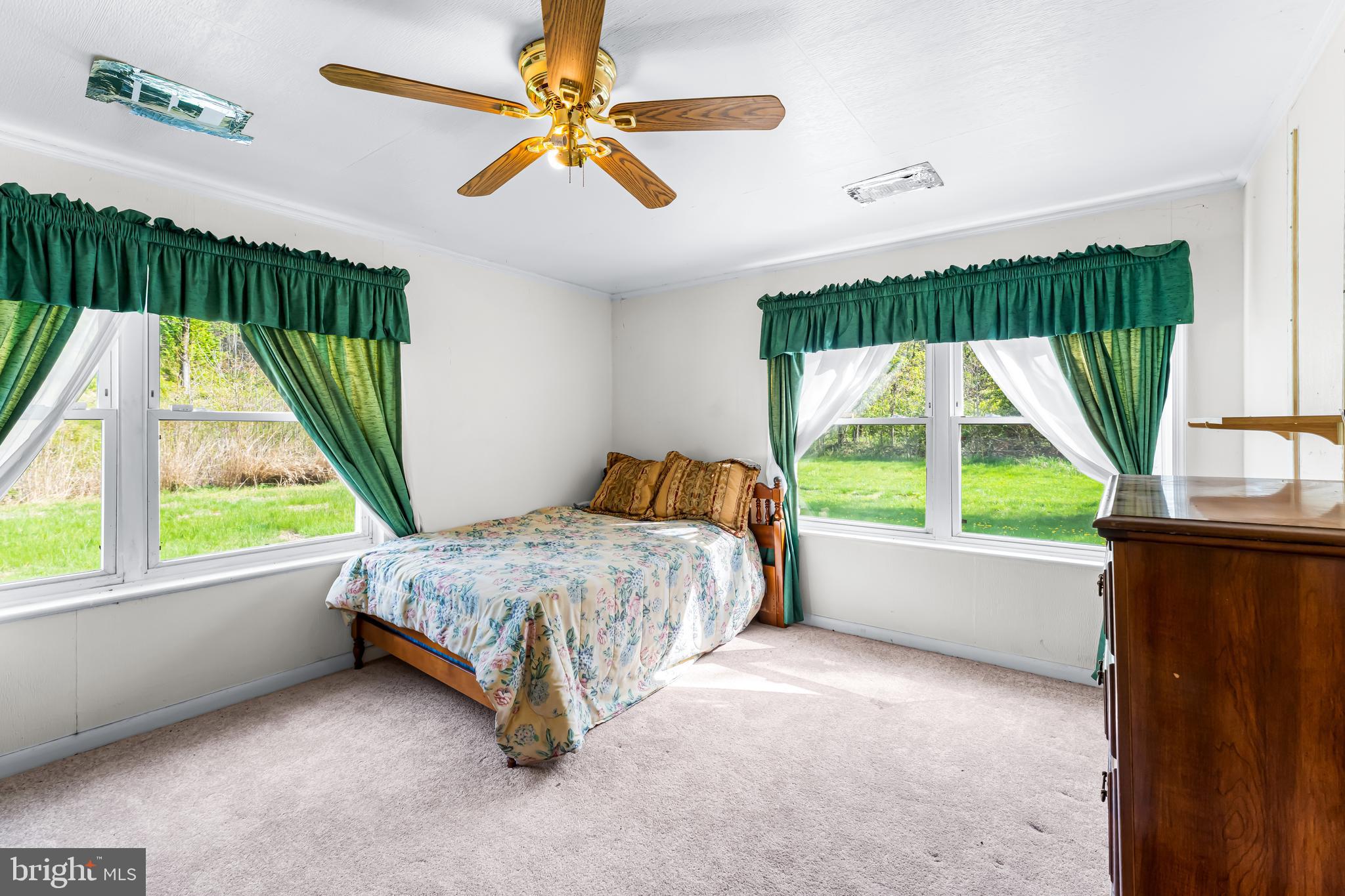 1112 Owens Road Oxon Hill, MD 20745 - Photo 21 of 30 a bed room with a bed and a large window