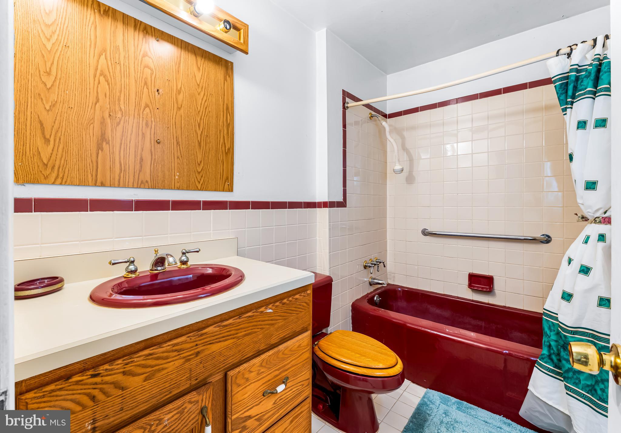 1112 Owens Road Oxon Hill, MD 20745 - Photo 27 of 30 a bathroom with a sink toilet and shower