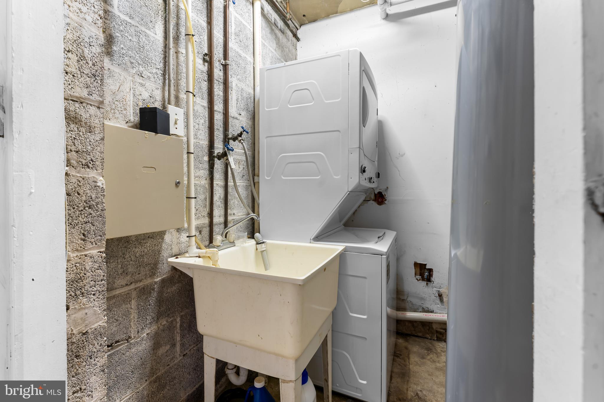 1112 Owens Road Oxon Hill, MD 20745 - Photo 28 of 30 a bathroom with a sink and a mirror