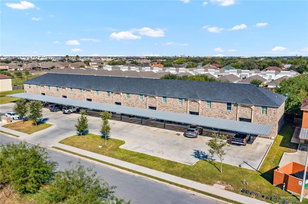 1400 Humming Bird Court, Unit 5 Pharr, TX 78577 - Photo 8 of 8 an aerial view of a house with outdoor space
