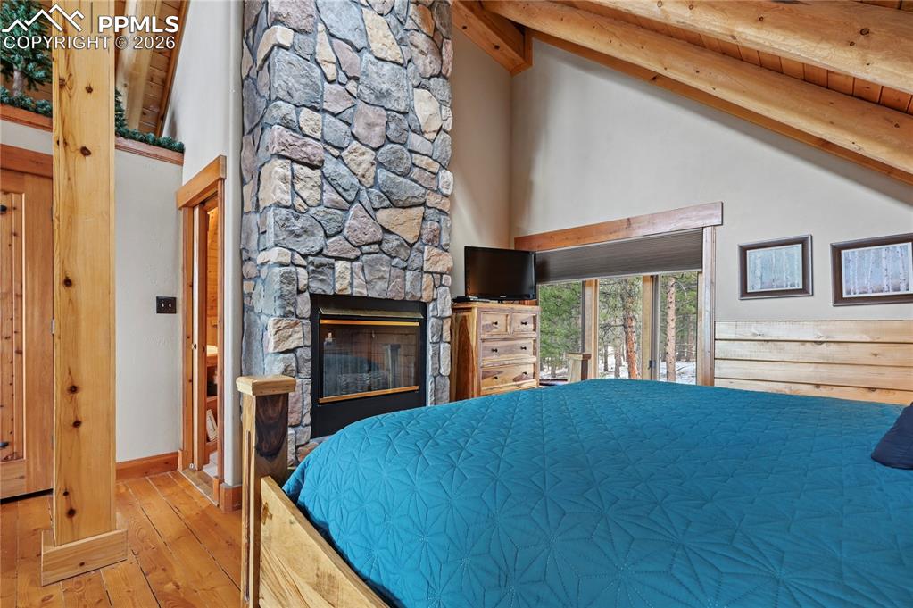 3613 Trail Creek Road Florissant, CO 80816 - Photo 24 of 43 a view of a livingroom with a fireplace and a window
