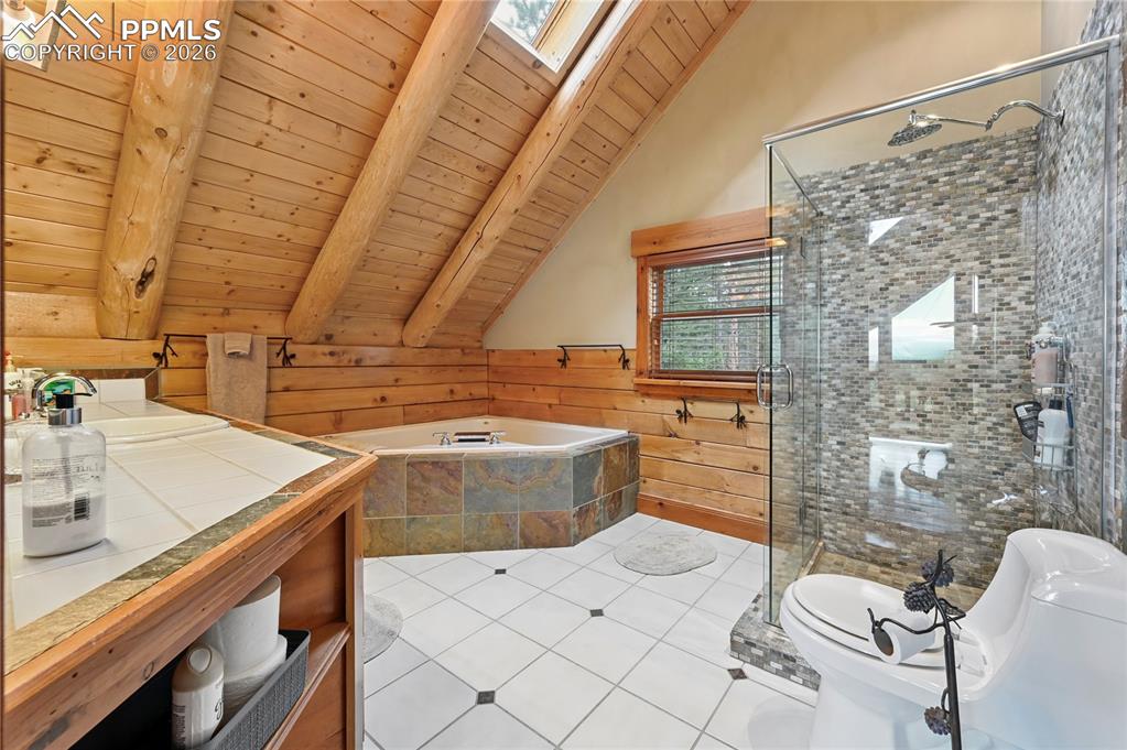 3613 Trail Creek Road Florissant, CO 80816 - Photo 25 of 43 a view of a kitchen with wooden floor and a sink