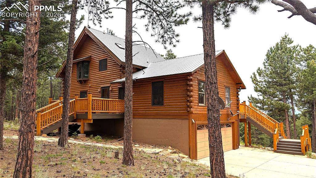 3613 Trail Creek Road Florissant, CO 80816 - Photo 4 of 43 a view of house with a yard