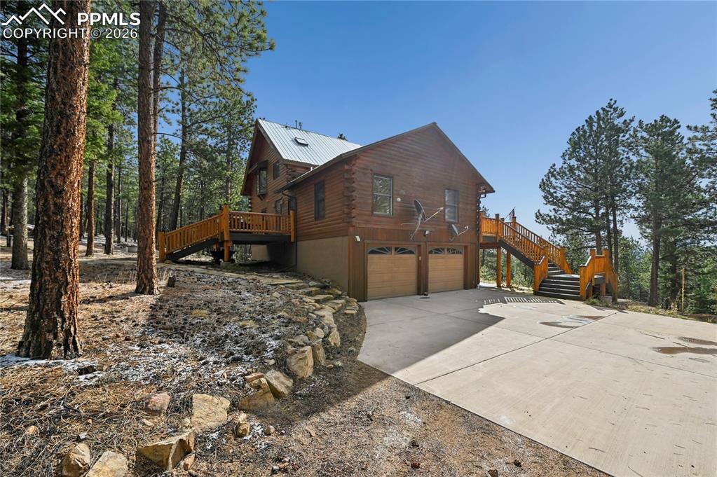3613 Trail Creek Road Florissant, CO 80816 - Photo 6 of 43 a view of a house with a snow in the yard