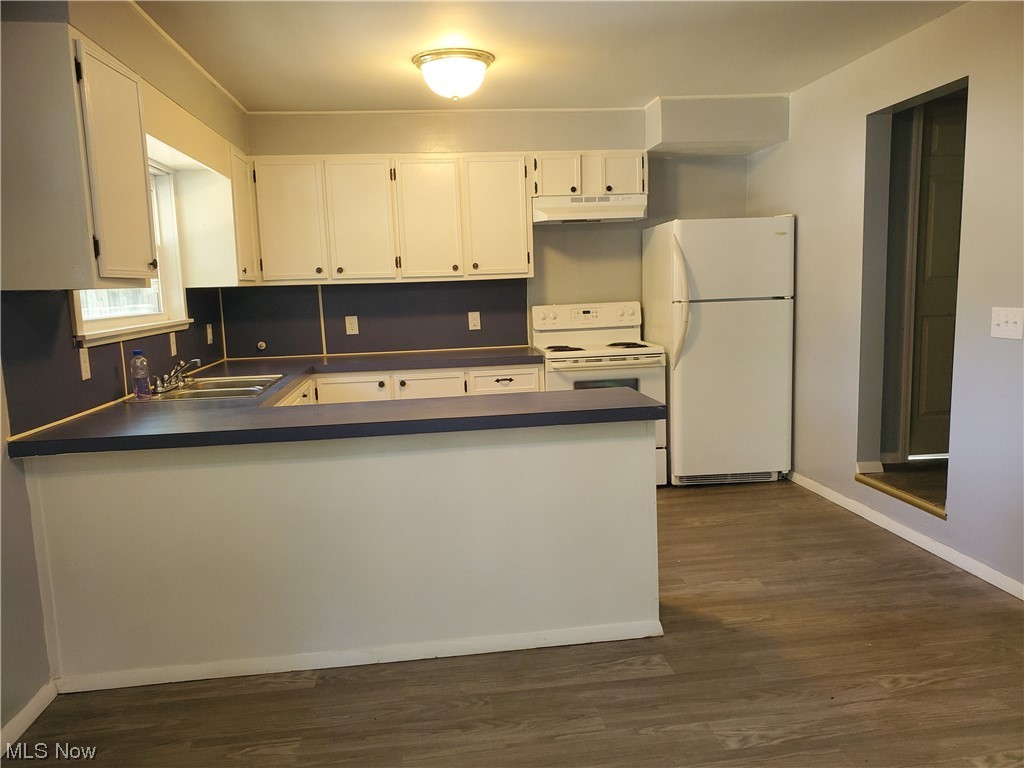 279 Devonshire Road Vermilion, OH 44089 - Photo 14 of 35 Access to the right takes to the possible walk-in pantry and access to basement