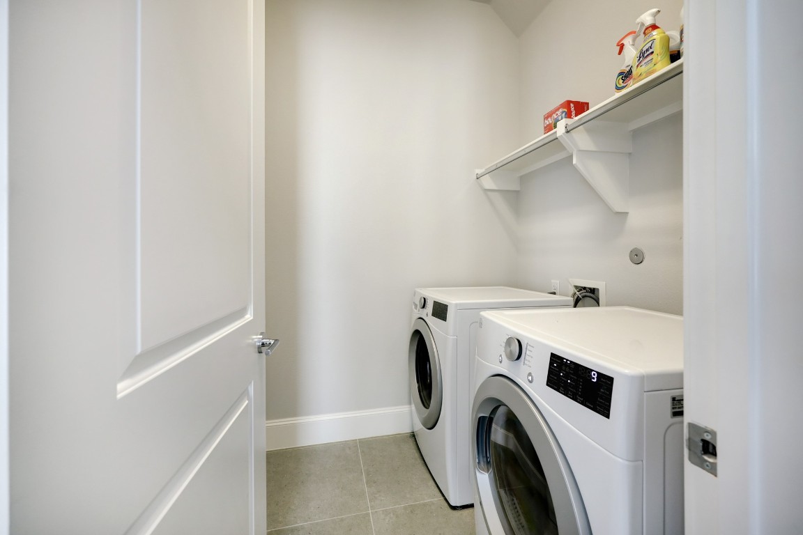 6103 Alexandra Grove Place Houston, TX 77055 - Photo 12 of 19 Second floor utility room includes washer & dryer