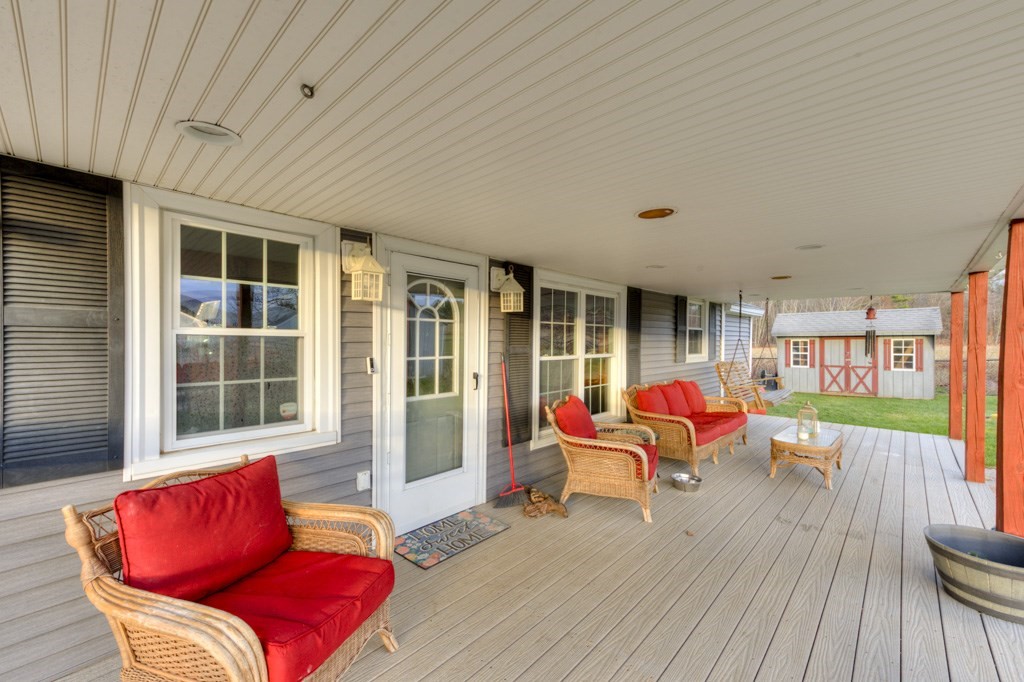 57 Carpenter Hill Road Charlton, MA 01507 - Photo 3 of 16 a living room filled with furniture and a wooden floor