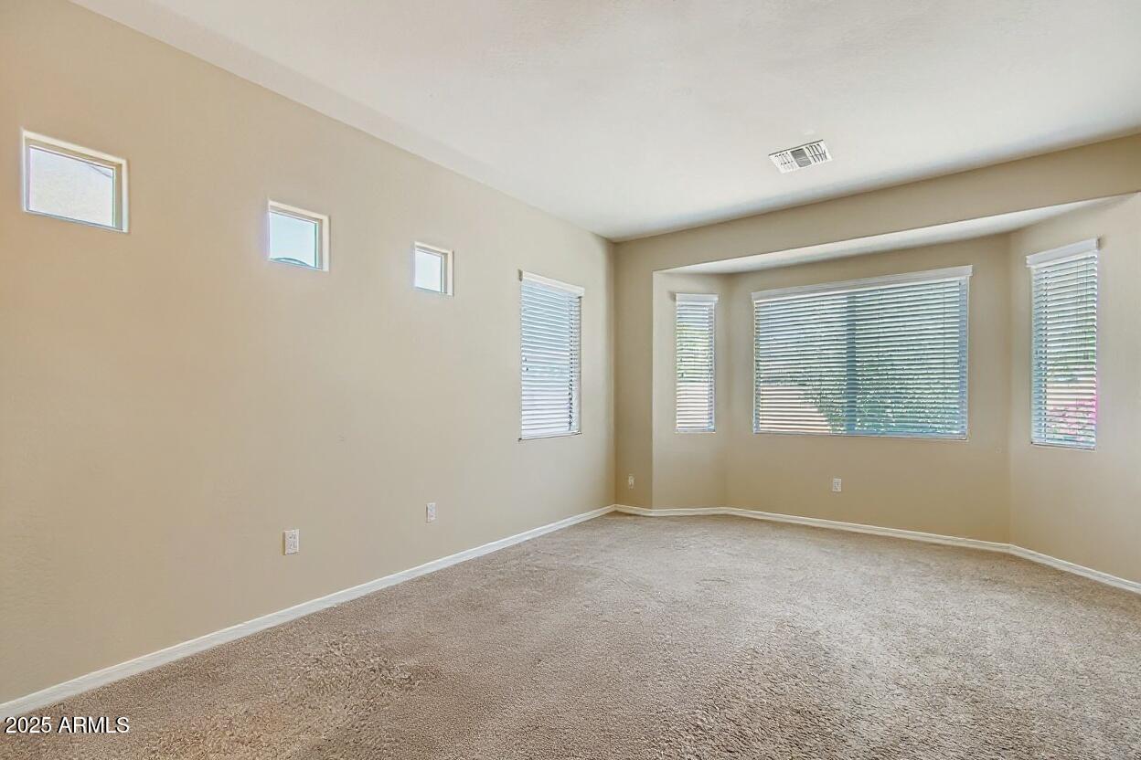 16192 West Berkeley Road Goodyear, AZ 85395 - Photo 20 of 44 Primary Bedroom