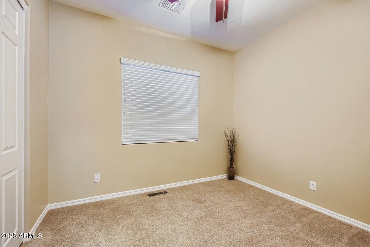 16192 West Berkeley Road Goodyear, AZ 85395 - Photo 36 of 44 Bedroom 3