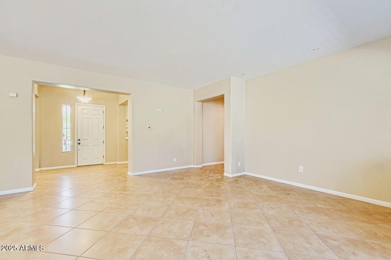 16192 West Berkeley Road Goodyear, AZ 85395 - Photo 8 of 44 Vacant living room 2