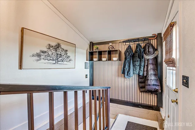 a view of a hallway with a window