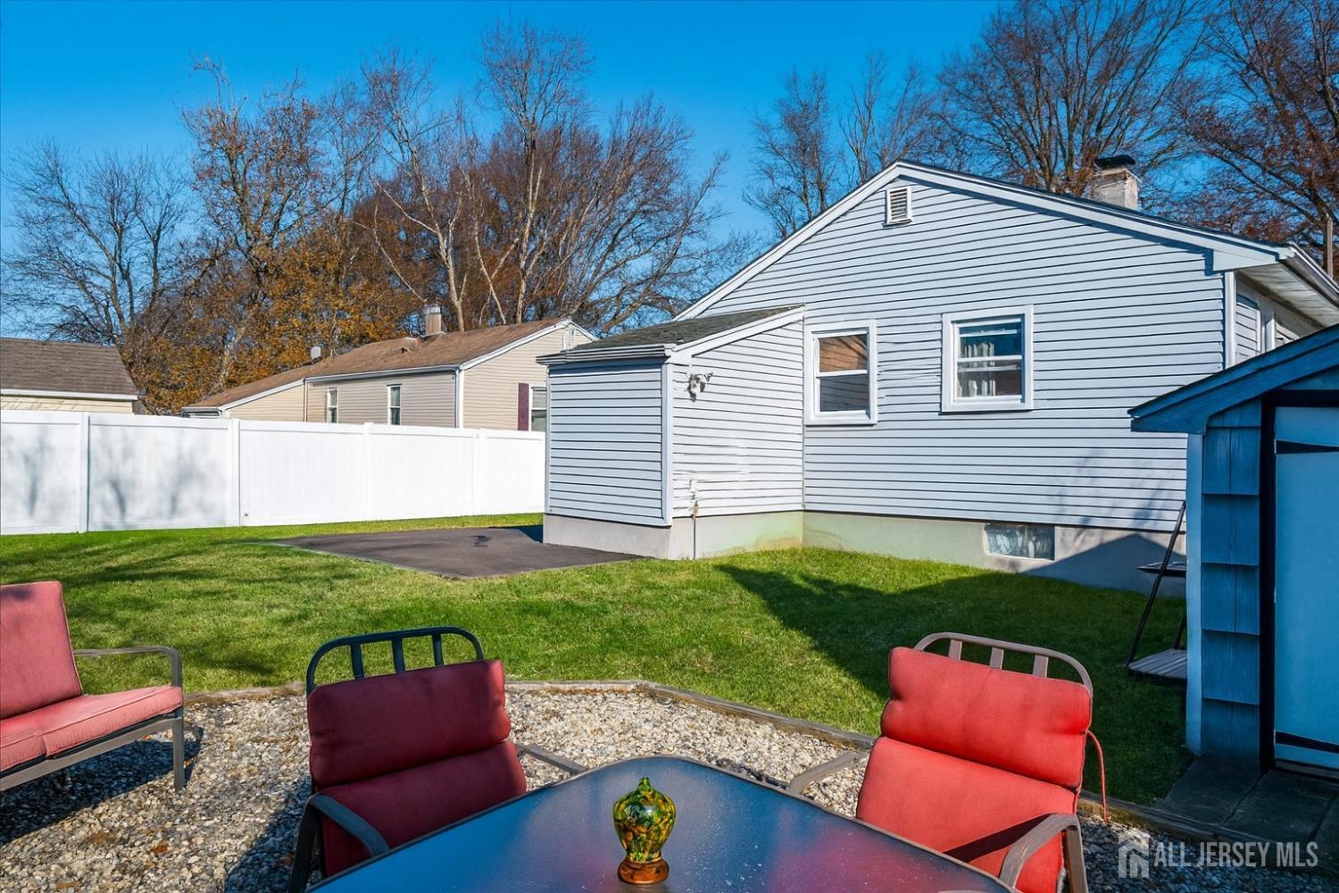 105 Madison Avenue Middlesex, NJ 08846 - Photo 4 of 27 a view of backyard with outdoor seating and green space