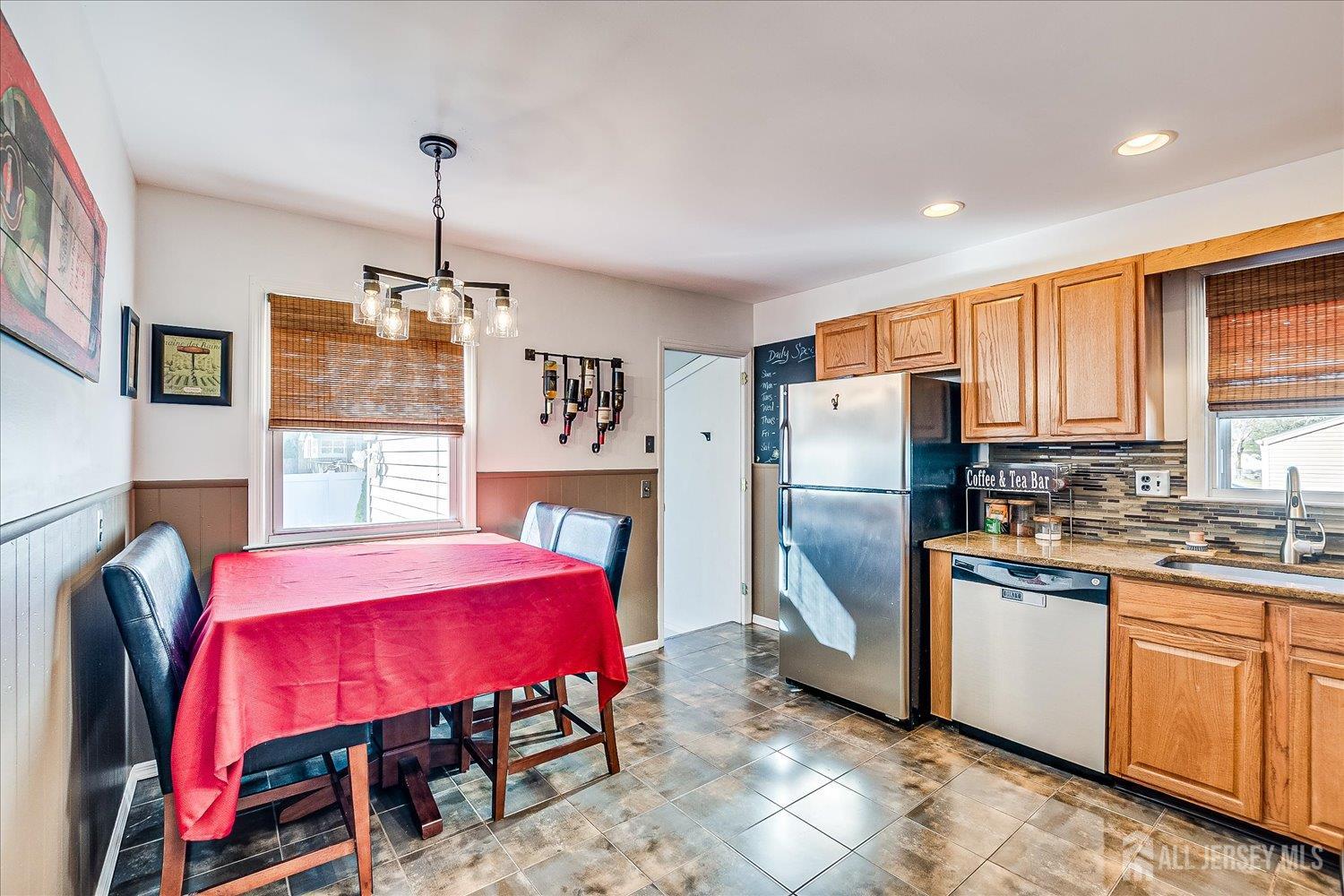 105 Madison Avenue Middlesex, NJ 08846 - Photo 7 of 27 a kitchen that has a lot of cabinets and refrigerator in it