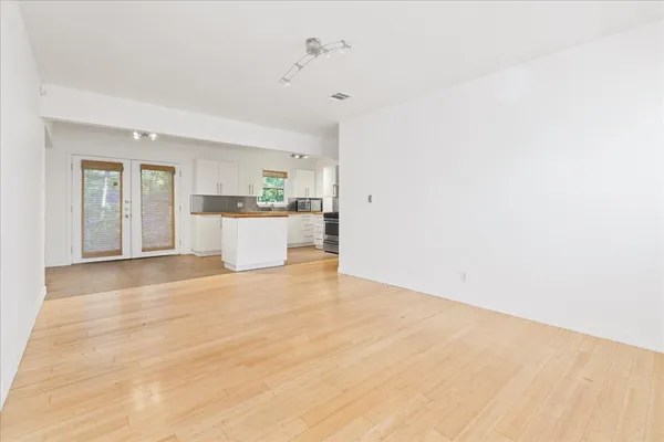 a view of a kitchen with a sink