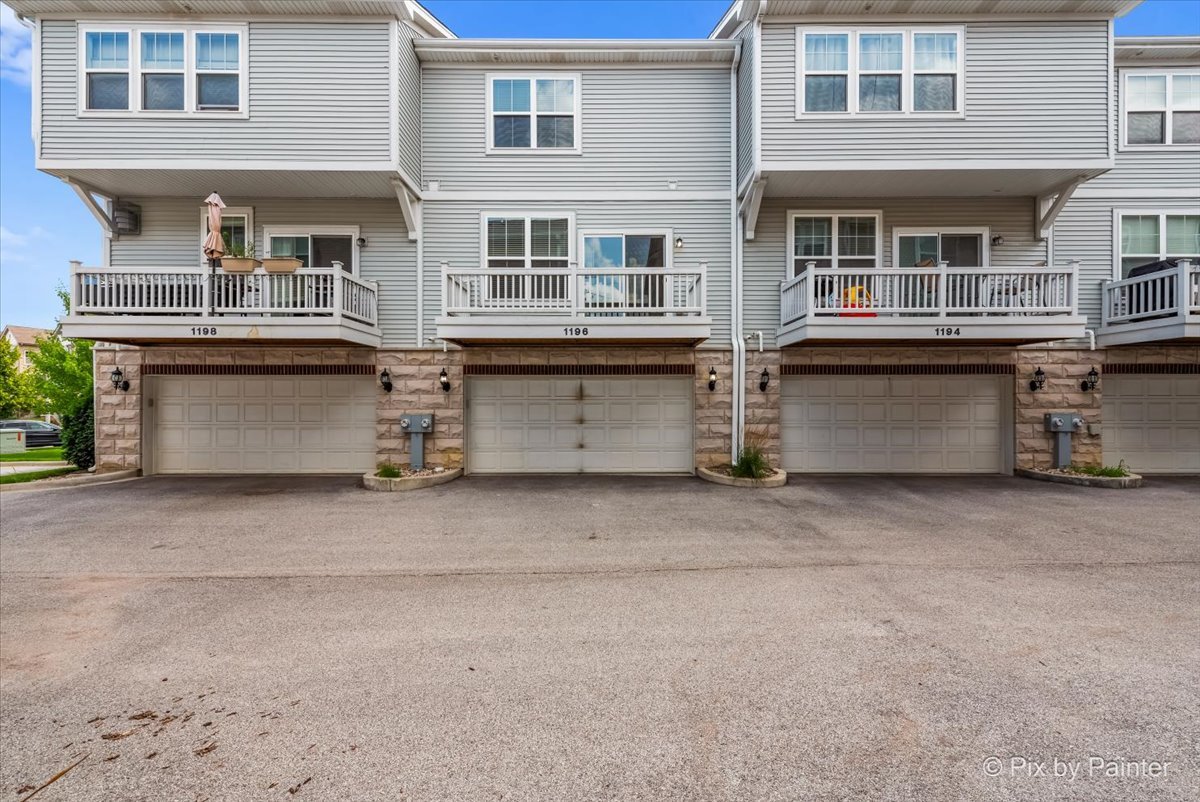 1196 Colfax Avenue Des Plaines, IL 60016 - Photo 23 of 28 an outdoor view of building with large windows