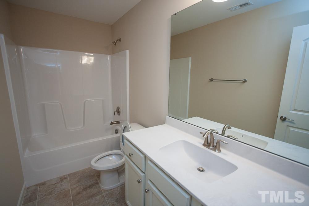 1856 Swepsonville Road Graham, NC 27253 - Photo 20 of 25 a bathroom with a sink toilet and shower