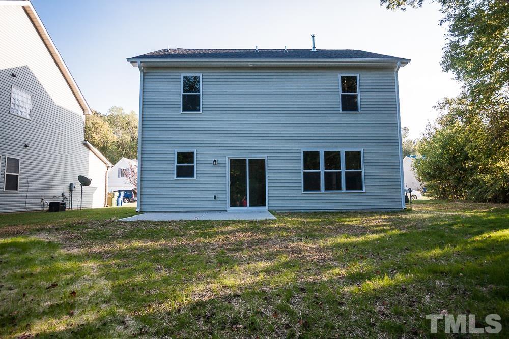 1856 Swepsonville Road Graham, NC 27253 - Photo 6 of 25 a view of a house with yard and garage