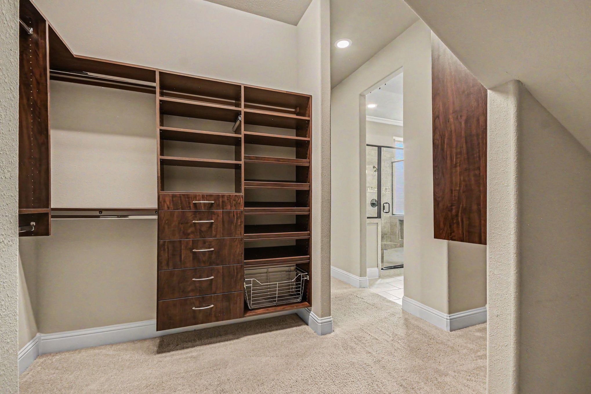 3310 Ralston Edge Lane Houston, TX 77059 - Photo 49 of 50 a view of walk in closet with clothes