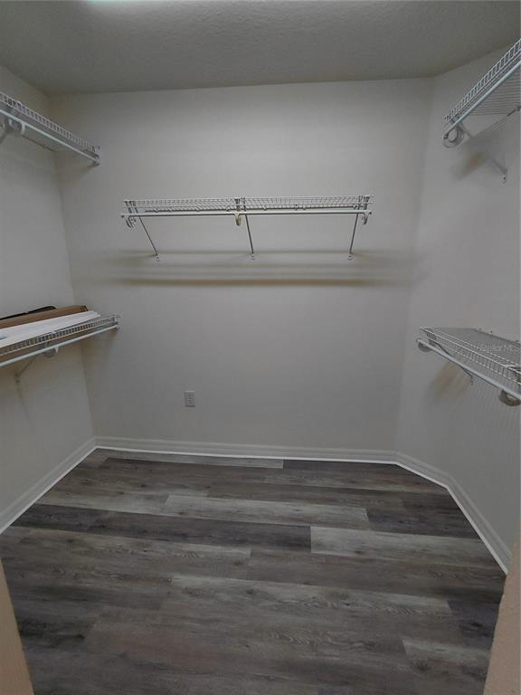 14295 Southwest 17th Place Ocala, FL 34481 - Photo 15 of 34 a view of a room with racks on the wall