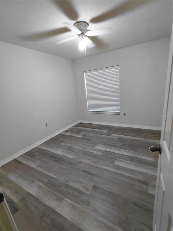 14295 Southwest 17th Place Ocala, FL 34481 - Photo 28 of 34 wooden floor in a room