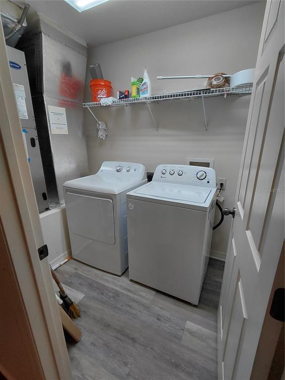 14295 Southwest 17th Place Ocala, FL 34481 - Photo 32 of 34 a utility room with dryer and washer