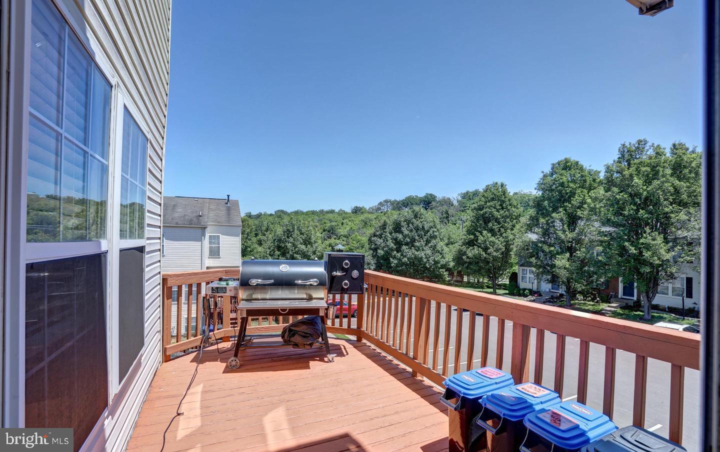 102 Cagney Terrace Southeast Leesburg, VA 20175 - Photo 13 of 26 a view of a chair and tables