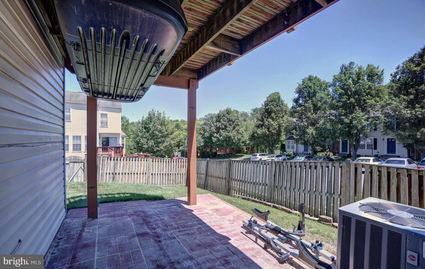 102 Cagney Terrace Southeast Leesburg, VA 20175 - Photo 24 of 26 a view of a pathway with a wooden fence