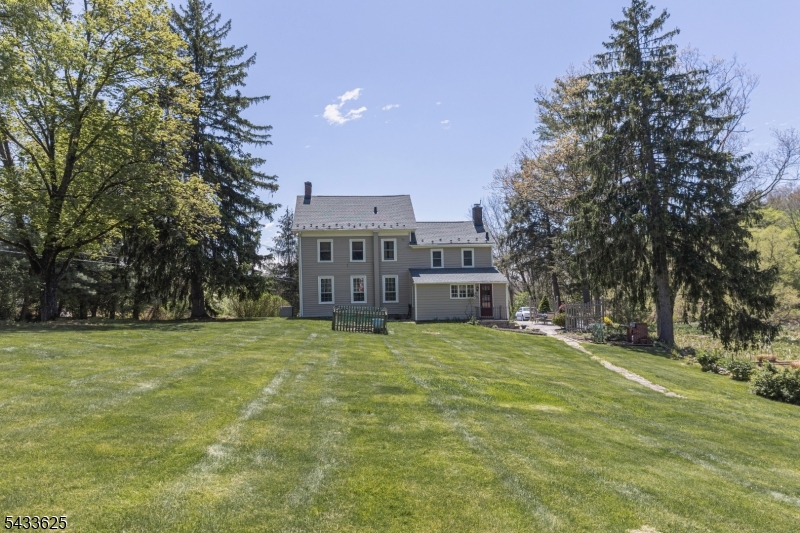 449 Stamets Road Milford, NJ 08848 - Photo 34 of 44 a tall house with a big yard and large trees