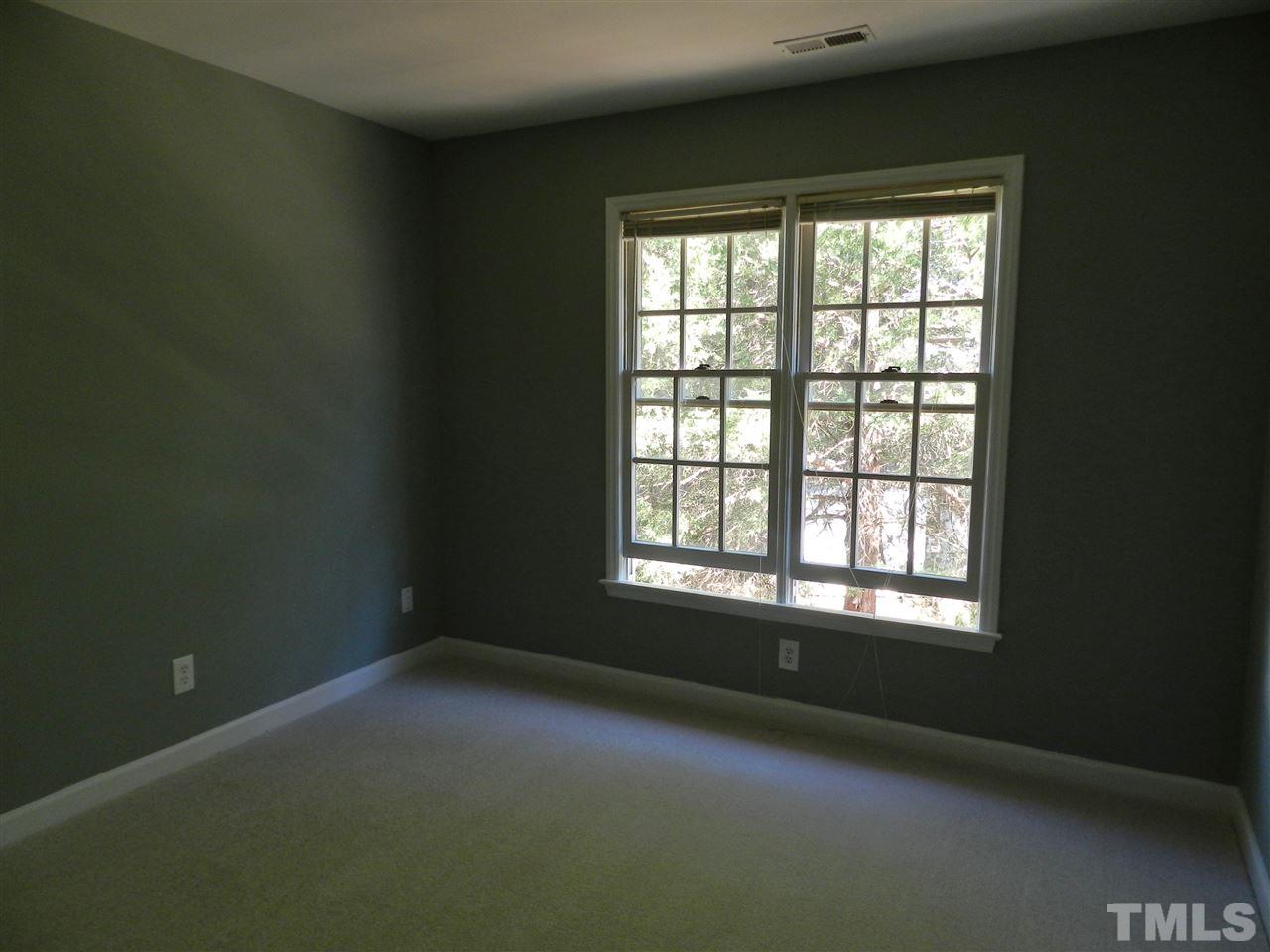 103 Rother Lane Durham, NC 27707 - Photo 18 of 24 an empty room with a window