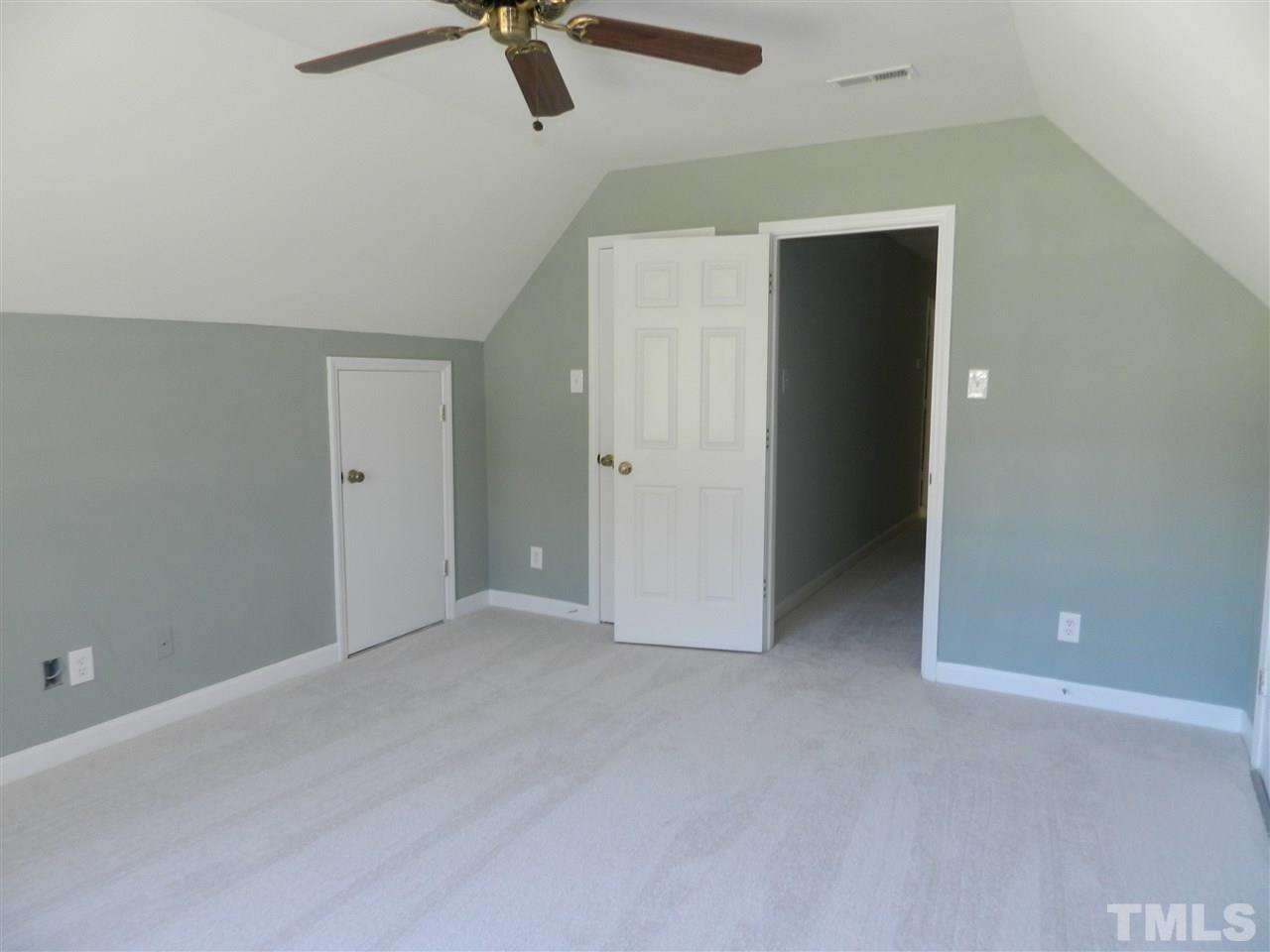 103 Rother Lane Durham, NC 27707 - Photo 19 of 24 a view of a room with a ceiling fan