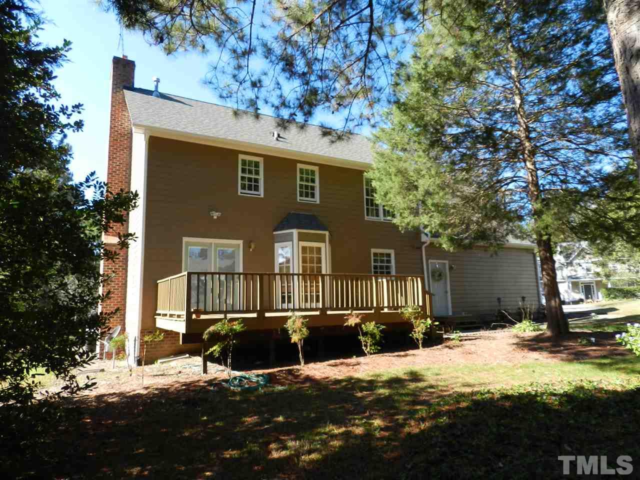 103 Rother Lane Durham, NC 27707 - Photo 22 of 24 a front view of a house with a yard