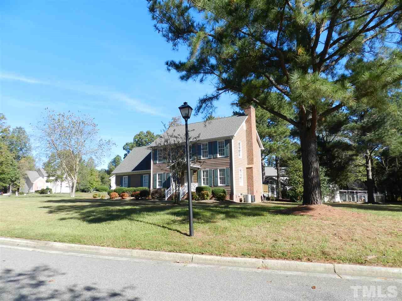 103 Rother Lane Durham, NC 27707 - Photo 24 of 24 a view of house with outdoor space and tree s