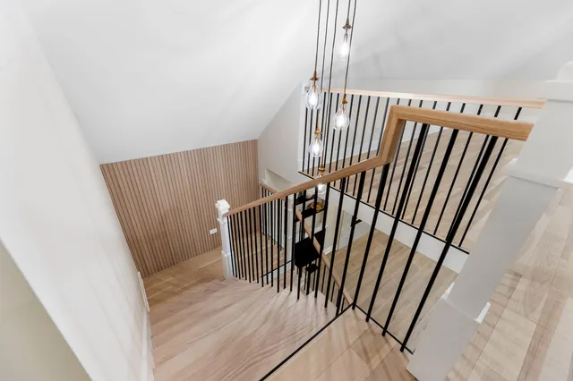 a view of a hallway with staircase