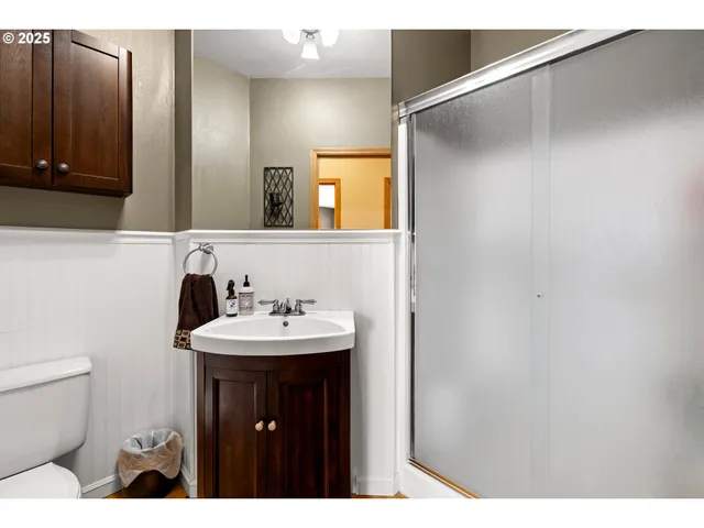 a bathroom with a sink and mirror