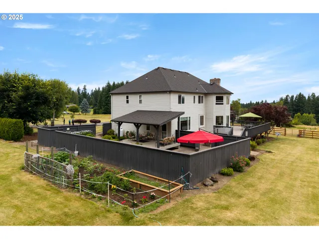 a view of swimming pool with a table and chairs