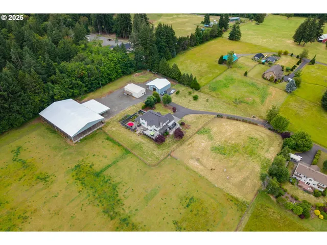 a view of a pool a yard and mountain view