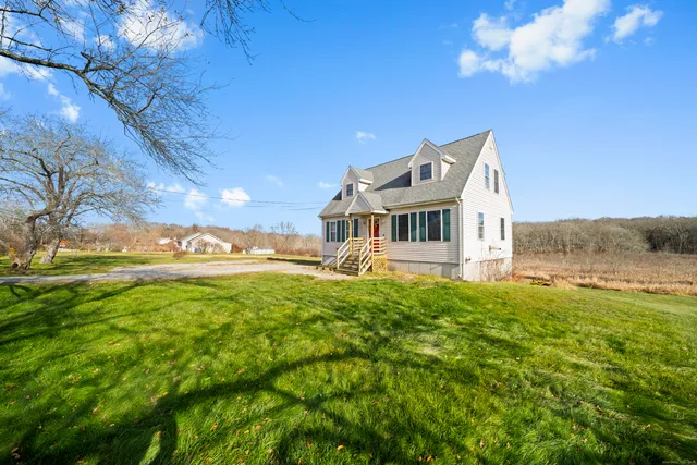 a view of a house with a big yard