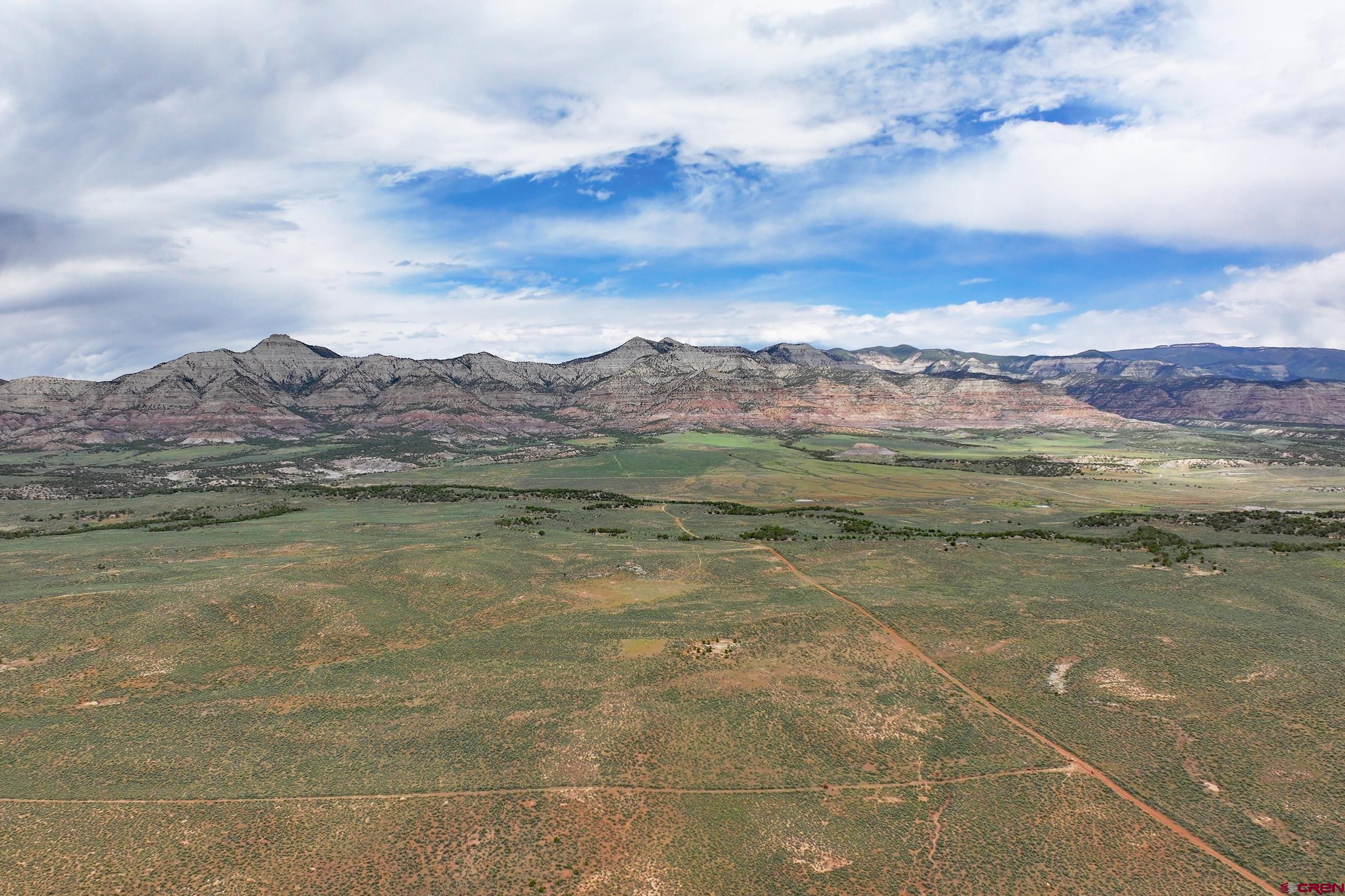 3 53 1/2 Road De Beque, CO 81630 - Photo 5 of 8 a view of an outdoor space and mountain view