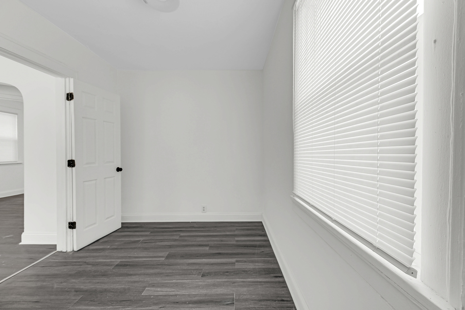1032 West 103rd Place Chicago, IL 60643 - Photo 11 of 19 a view of a hallway with wooden floor and entryway