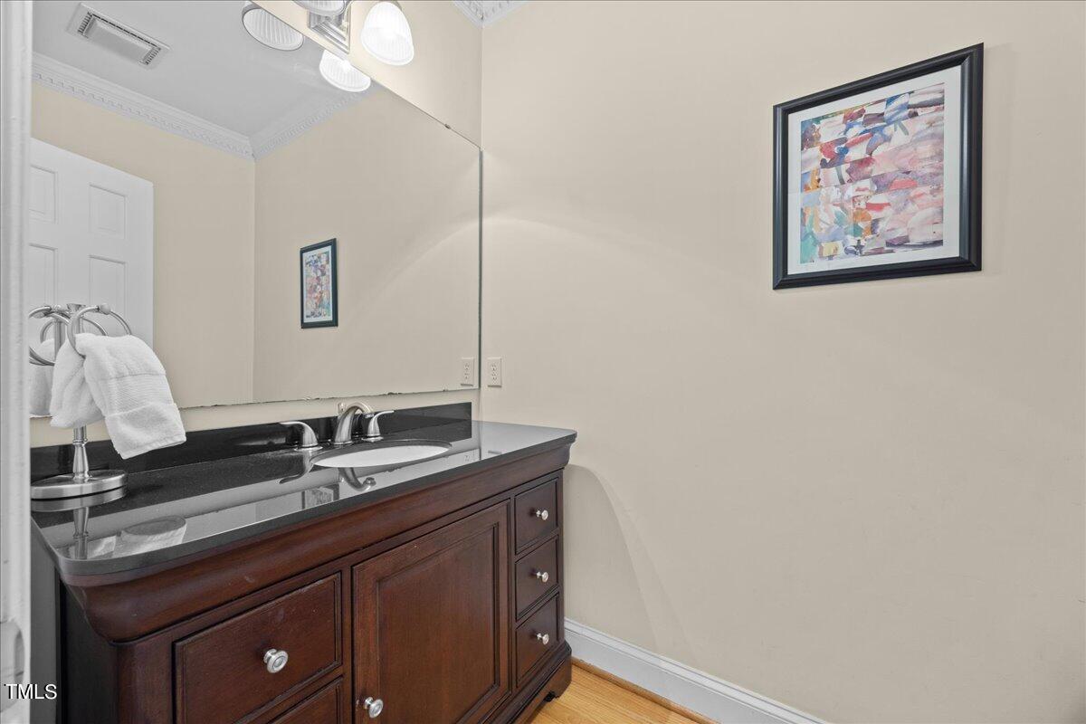 10036 Old Warden Road Raleigh, NC 27615 - Photo 22 of 42 Half bath on main level