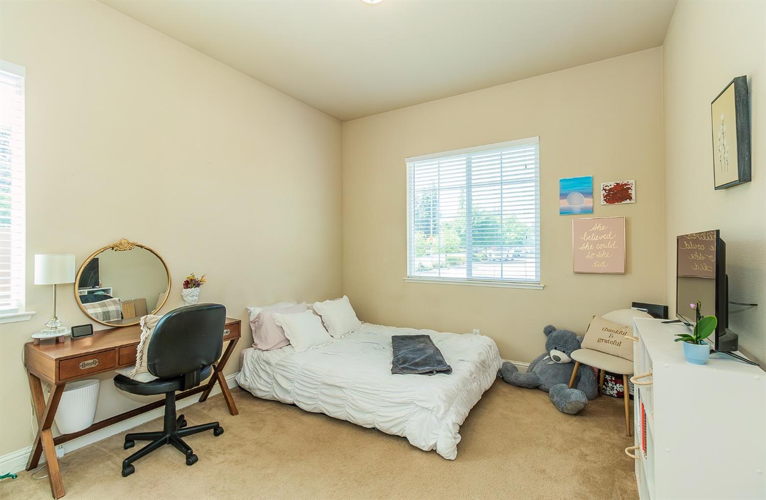 2610 Sample Avenue Clovis, CA 93611 - Photo 14 of 36 a workspace with a couch and a window
