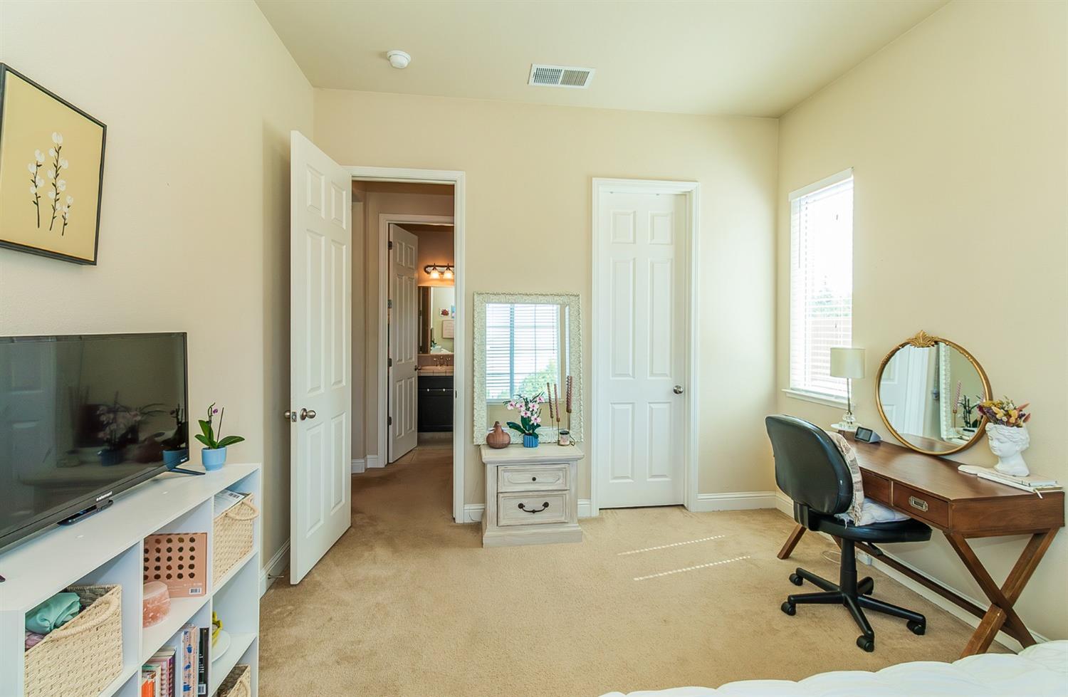 2610 Sample Avenue Clovis, CA 93611 - Photo 15 of 36 a living room with furniture and a flat screen tv