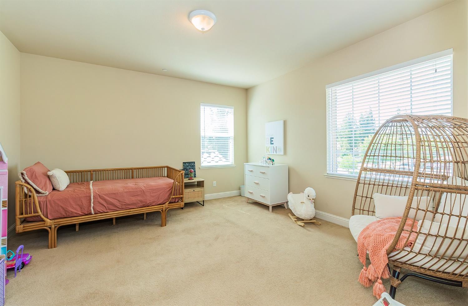 2610 Sample Avenue Clovis, CA 93611 - Photo 28 of 36 a bedroom with furniture and a window