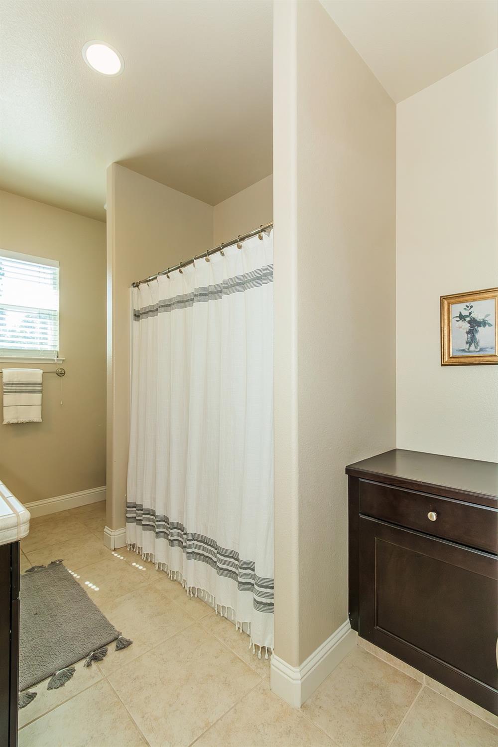 2610 Sample Avenue Clovis, CA 93611 - Photo 31 of 36 a view of a storage and utility room with closet