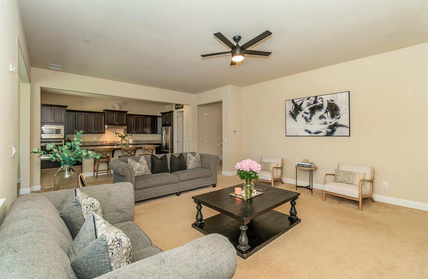 2610 Sample Avenue Clovis, CA 93611 - Photo 8 of 36 a living room with furniture and a large window