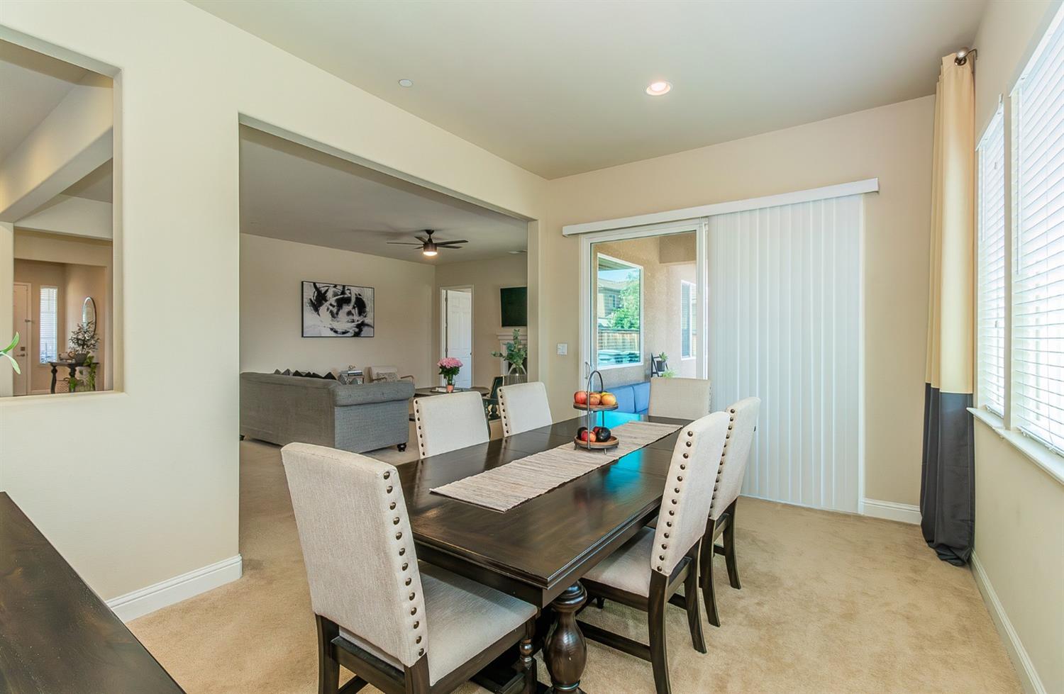 2610 Sample Avenue Clovis, CA 93611 - Photo 9 of 36 a dining room with furniture and window